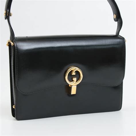 gucci zipper sleeve black leather bag|vintage gucci bag black leather.